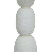 TOV Furniture Pebble Papier Mache Table Lamp with rounded pebble-shaped base and neutral fabric shade on a wooden surface
