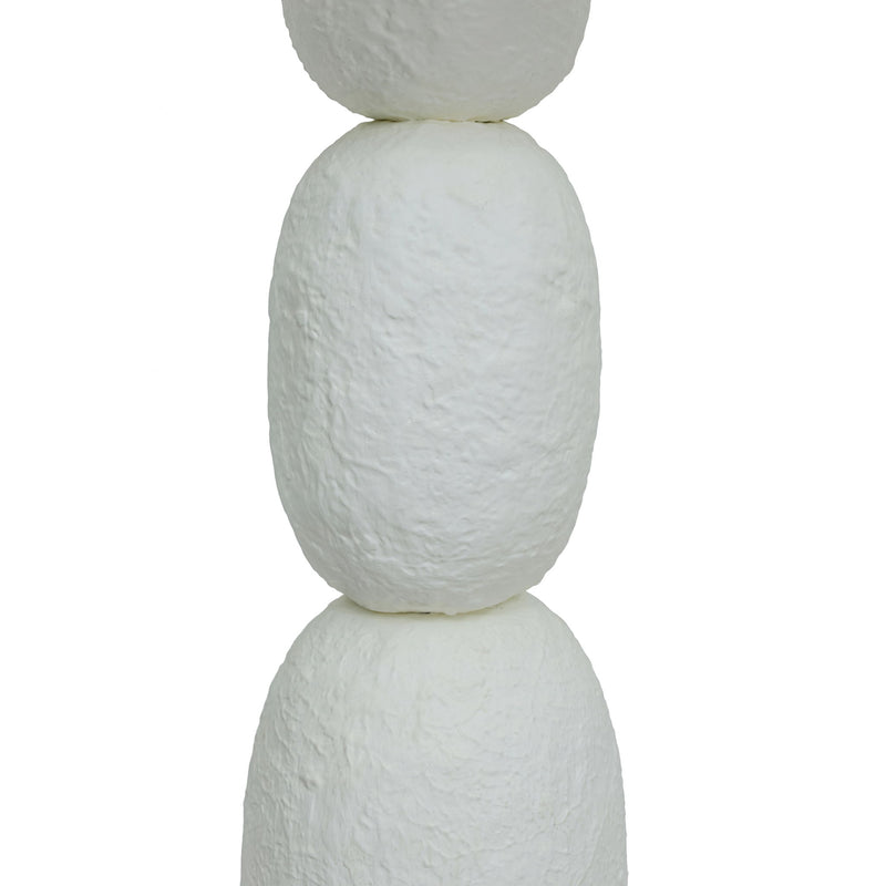 TOV Furniture Pebble Papier Mache Table Lamp with rounded pebble-shaped base and neutral fabric shade on a wooden surface