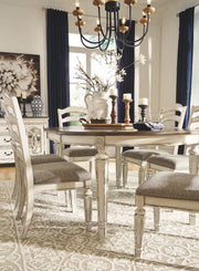 Realyn - Dining UPH Side Chair (Set of 2) - Ladderback - Chipped White - R&R Furniture Gallery (Fountain Valley, CA)