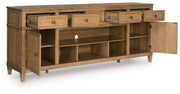 Sharlance - XL TV Stand With Fireplace Option - Light Brown - R&R Furniture Gallery (Fountain Valley, CA)