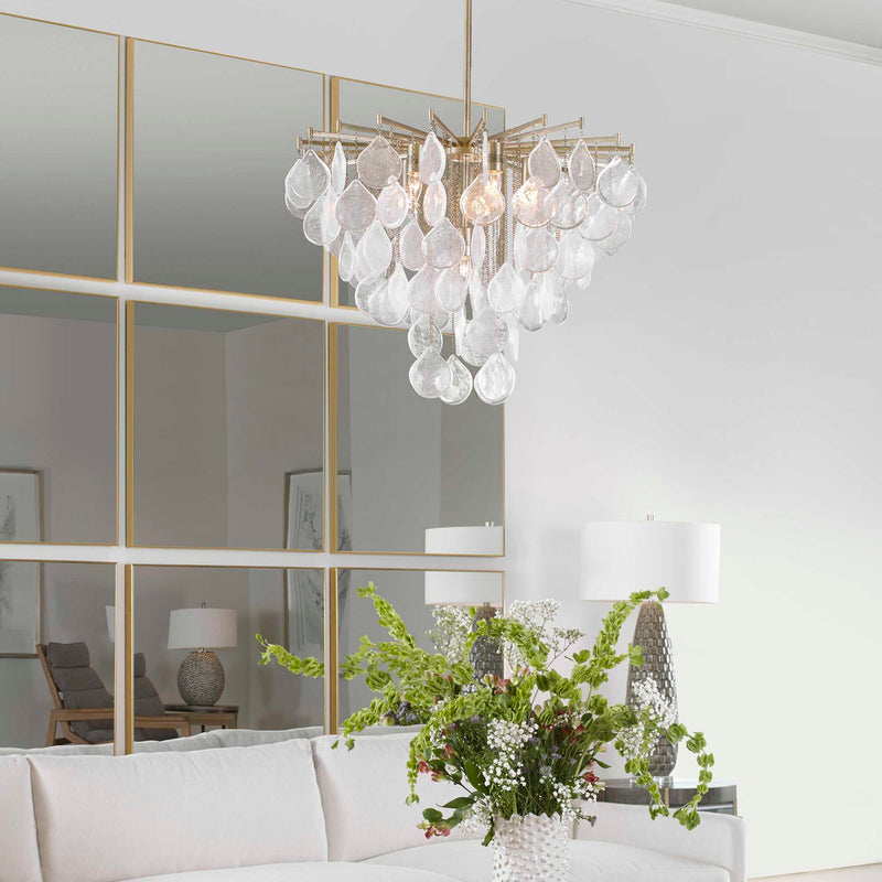 Uttermost Goccia tear drop glass pendant light hanging from ceiling, modern pendant lighting fixture with clear glass design.