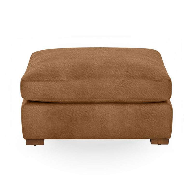 Classic Home Audrey upholstered ottoman with a plush fabric top and wooden legs, ideal as a stylish footrest or accent piece.