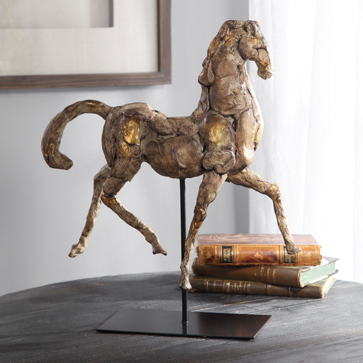 Gold horse sculpture by Uttermost, detailed Caballo figurine with a shiny, metallic finish, perfect for decorative display.