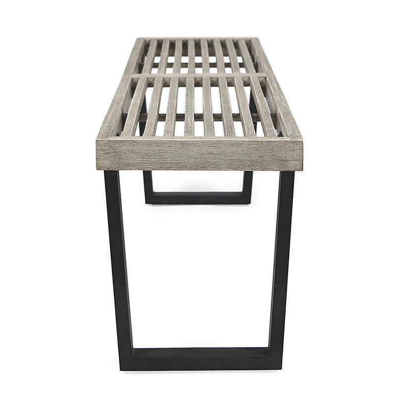 Noble House Intrinsic outdoor dining bench with slat top, made of durable wood, suitable for patio or garden seating.