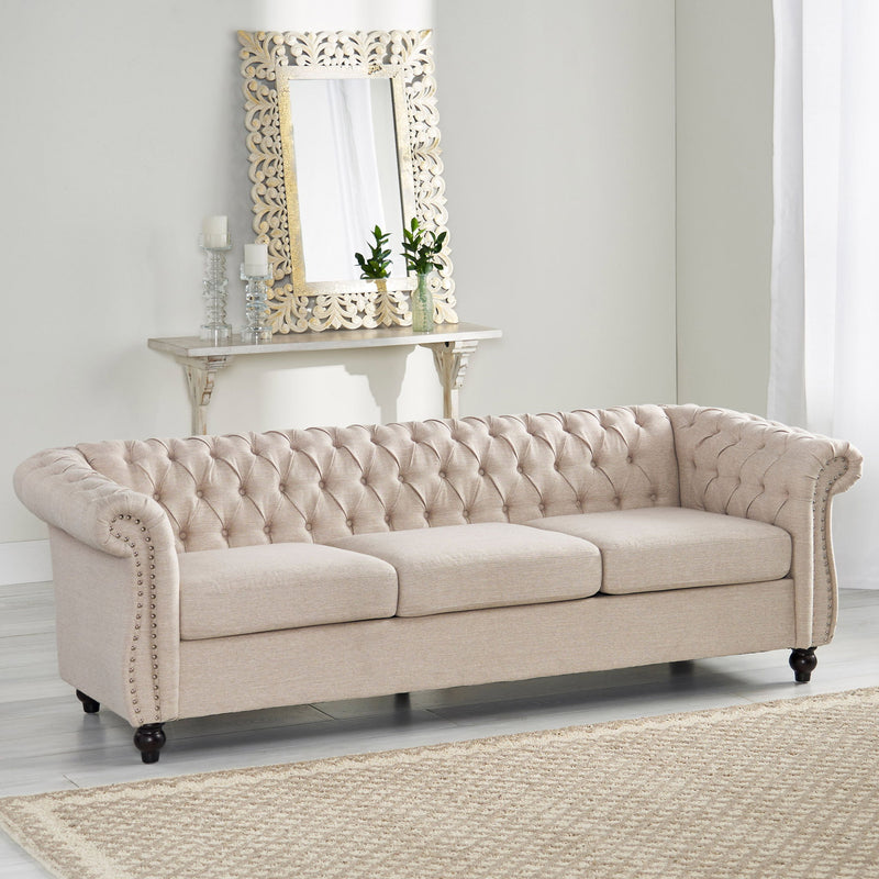 Noble House Chesterfield style 3-seater sofa with deep button tufting and classic stationary design in a luxurious fabric.