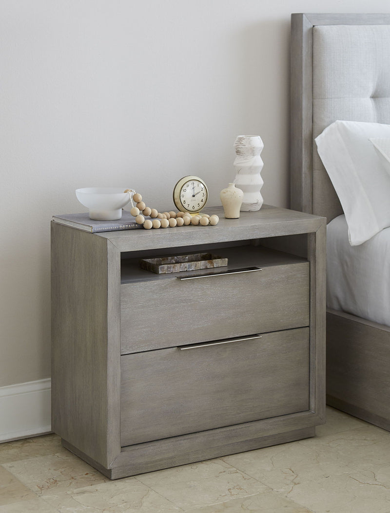 Modus Oxford two-drawer nightstand in mineral finish with sleek design and modern hardware, shown with a bedroom setting.