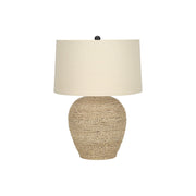 Beige 8th Street table lamp with rattan and resin base, transitional style, perfect for living room or bedside lighting.