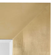 Gold wall mirror by Uttermost, Chaney collection, featuring a sleek, round design with a reflective glass surface.