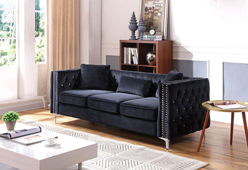Glory Furniture Paige stationary sofa with plush fabric upholstery and modern design, shown in a cozy living room setting.