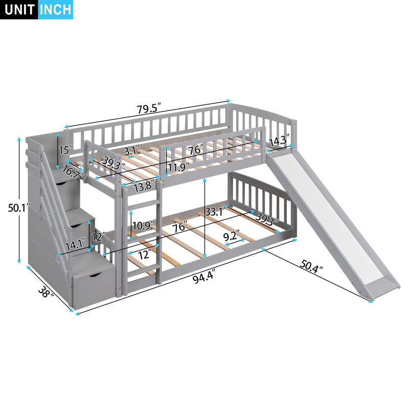 Gray DreamHaus twin over twin bunk bed with stairway, built-in drawers, and slide, featuring a sturdy frame and safety rails.