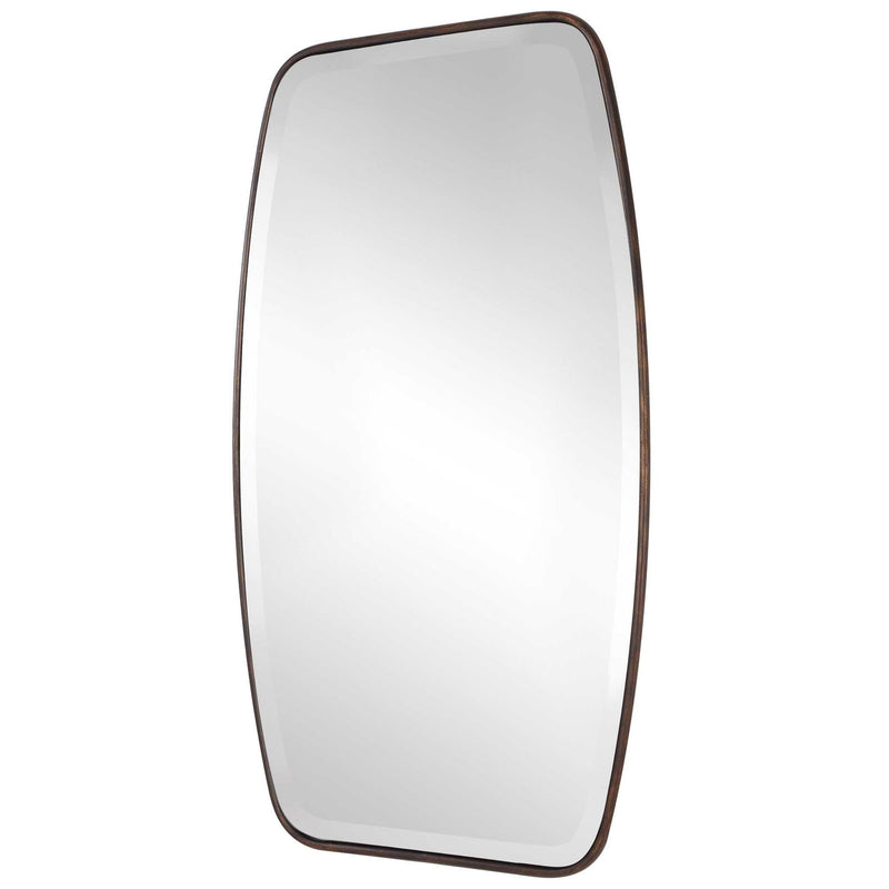 Uttermost Canillo wall mirror with a sleek frame, hanging on a modern wall, showcasing elegant mirror design and craftsmanship.