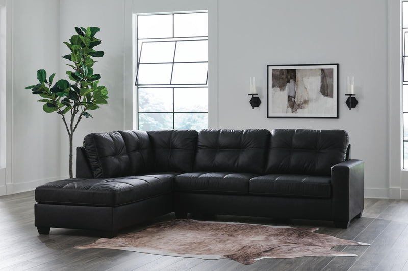 Benchcraft® Barlin Mills stationary sectional sofa with plush cushions and neutral fabric, shown in a modern living room setting.