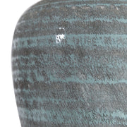Uttermost Pelia table lamp in light aqua with a sleek ceramic base and fabric shade, ideal for modern home decor.