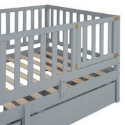 DreamHaus storage daybed with fence guardrails, two drawers, and split design for independent floor bed and daybed setup.