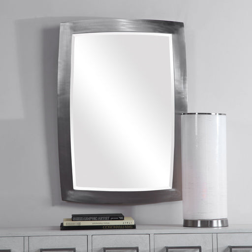 Uttermost Haskill wall mirror with brushed nickel finish, featuring a sleek, modern frame and reflective glass surface.