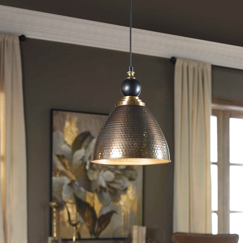 Uttermost Adastra 1-light pendant in antique brass with a sleek, modern design for stylish ceiling lighting.