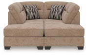 Benchcraft Olten stationary sectional sofa with plush cushions and fabric upholstery, shown in a modern living room setting.