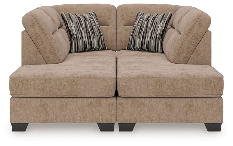 Benchcraft Olten stationary sectional sofa with plush cushions and fabric upholstery, shown in a modern living room setting.