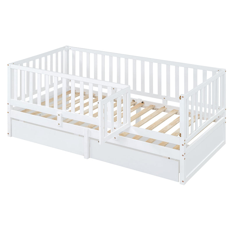 DreamHaus storage daybed with fence guardrails and two drawers, split into independent floor bed and daybed for versatile use.