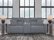 Modmax II reclining sectional in salt and pepper fabric by Signature Design by Ashley, showing plush cushions and reclining features.