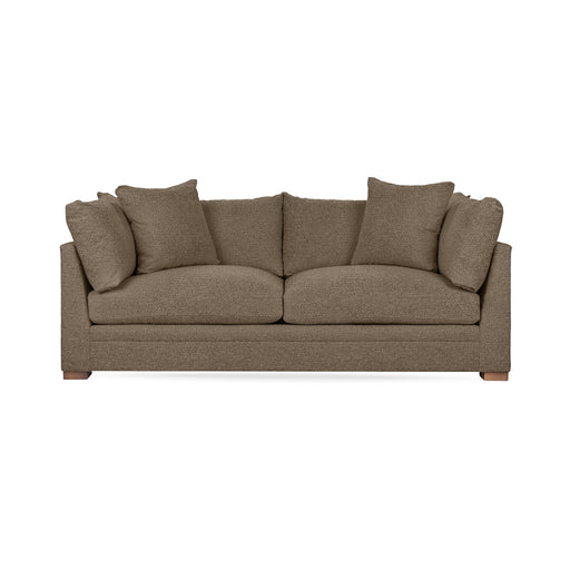 Classic Home Audrey stationary sofa with plush fabric, featuring a sleek design and comfortable cushioning in a cozy living room setting.