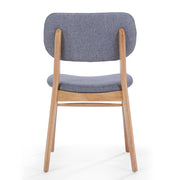 Set of two Noble House Voyager upholstered accent chairs with splayed legs and wood frames, featuring plush fabric and modern design.