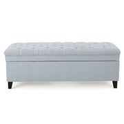Noble House Juliana storage ottoman with birch wood legs and plush fabric, offering stylish seating and hidden storage.