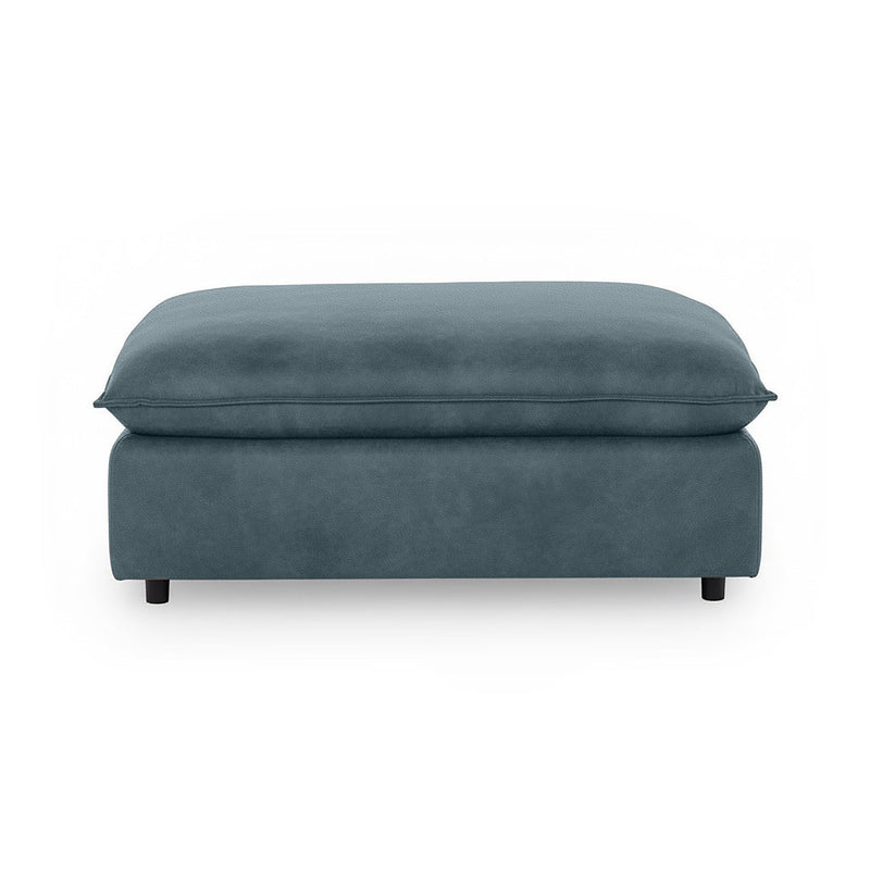 Classic Home Caplan upholstered ottoman with plush fabric and sturdy wooden legs, versatile for living room or seating area.