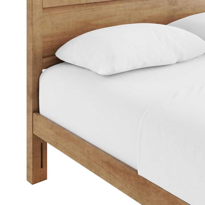 Ridgecrest Home Maddox panel bed with a modern wooden frame and clean design, shown in a well-lit bedroom setting.
