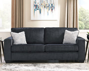 Signature Design by Ashley Altari sleeper sofa with plush fabric and modern design, shown in a folded and bed position.