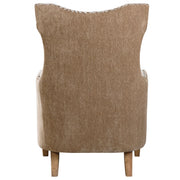 Light brown Kiango animal pattern armchair by Uttermost with plush upholstery and curved wooden legs.