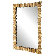 Gold Lev accent mirror by Uttermost featuring a sleek, modern design with a round shape and a polished gold finish.