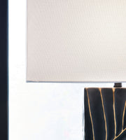 Bartlen - Poly Table Lamp - Black / Gold Finish - R&R Furniture Gallery (Fountain Valley, CA)