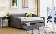 DreamHaus upholstered storage daybed with two drawers and wood slat support, showcasing a cozy, modern design for versatile bedroom use.