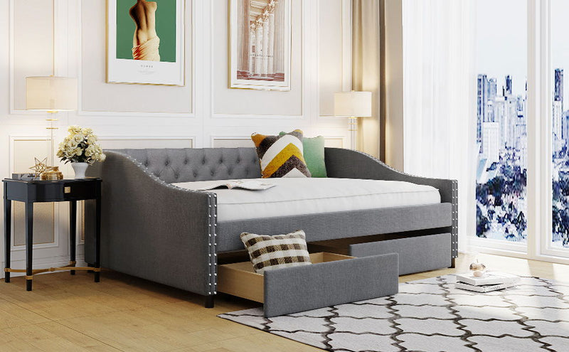 DreamHaus upholstered storage daybed with two drawers and wood slat support, showcasing a cozy, modern design for versatile bedroom use.