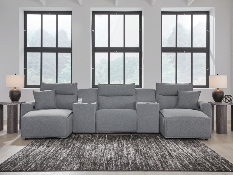 Signature Design by Ashley Modmax II reclining sectional in salt and pepper fabric, showing plush cushions and reclining seats.