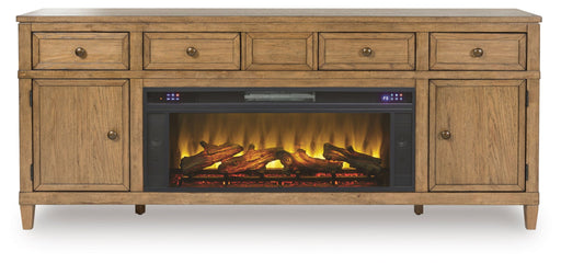 Sharlance 81-inch TV stand with electric fireplace from Signature Design by Ashley, featuring modern wood finish and built-in heating display.