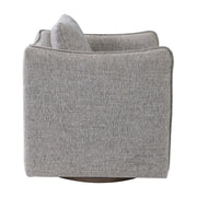 Uttermost Corben swivel chair with plush fabric upholstery and modern design, featuring a rounded back and sleek metal base.