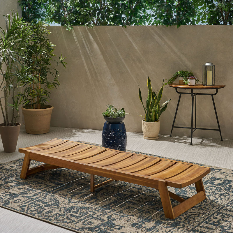 Noble House outdoor chaise lounge with adjustable seating and slat panel in yellow-brown color, perfect for outdoor relaxation.