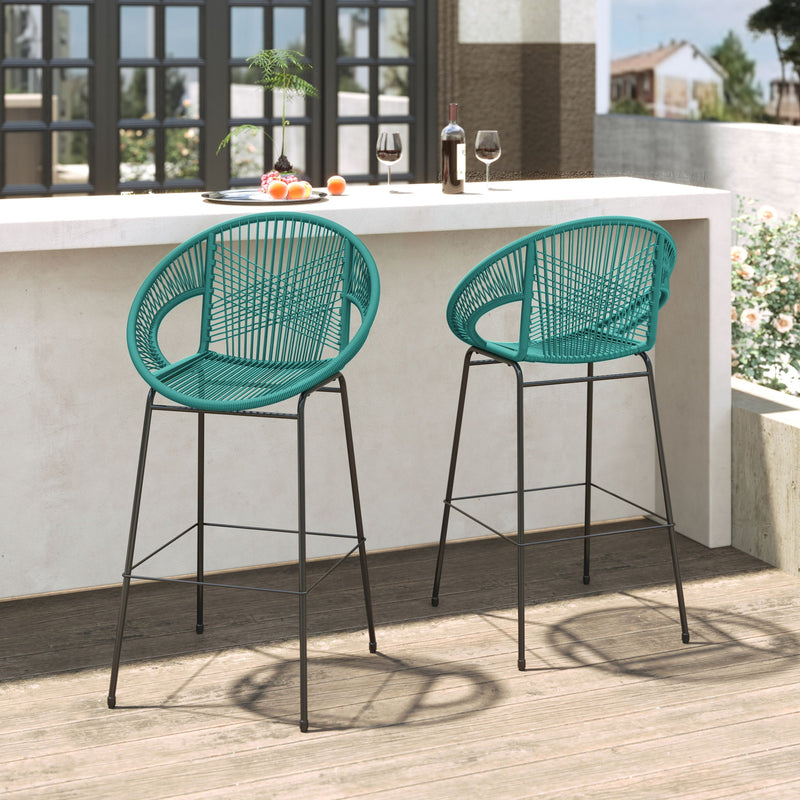 Set of two Noble House Ferrara outdoor patio barstools with woven seats and metal frames, ideal for outdoor dining and seating.