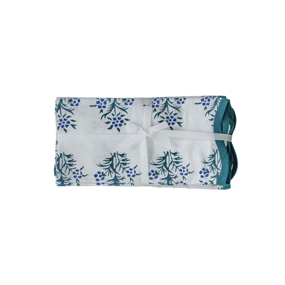 Set of four TOV Furniture Crissy cotton canvas printed napkins with blue cornflower design on soft fabric.