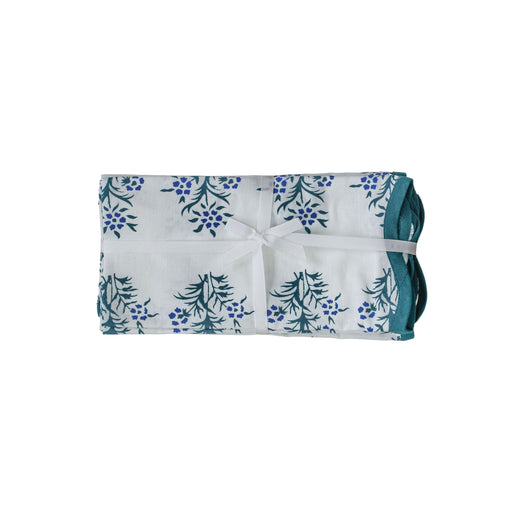 Set of four TOV Furniture Crissy cotton canvas printed napkins with blue cornflower design on soft fabric.