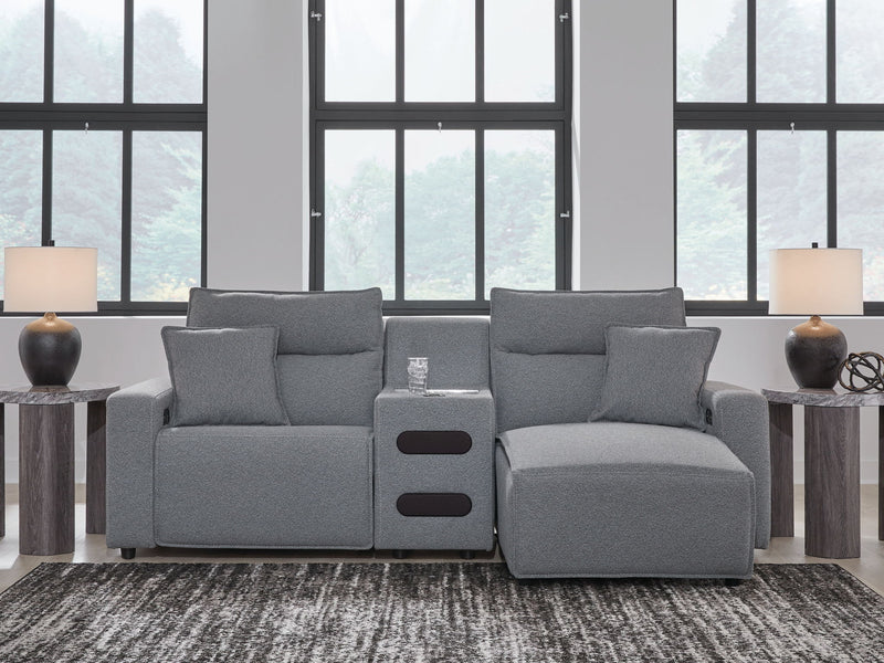 Signature Design by Ashley Modmax II reclining sectional in salt and pepper fabric, showing plush cushions and reclining features.