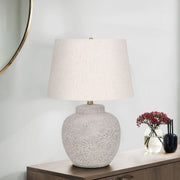 Modern concrete table lamp in cream color by 8th Street, featuring a sleek, minimalistic design for contemporary interiors.