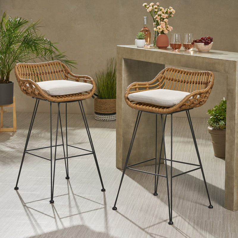 Noble House outdoor rattan bar chair with metal legs, part of a stool set, featuring woven rattan seat and sturdy metal frame.