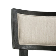 Noble House farmhouse style fabric upholstered side dining chairs set with wooden legs and cushioned seats.