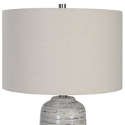 Uttermost Cyclone ivory table lamp with textured ceramic base and fabric shade, ideal for modern home decor.
