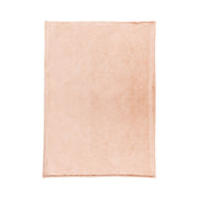 Soft beige Taiga throw blanket by Classic Home draped over a sofa, showcasing its cozy, textured fabric for warm comfort.