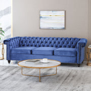 Noble House Chesterfield style 3-seater sofa with deep button tufting and classic rolled arms, beige upholstery, stationary design.