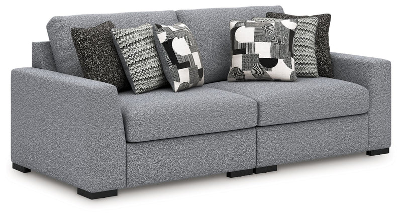 Benchcraft Bealton stationary sectional sofa with plush fabric upholstery and multiple seating sections in a modern living room